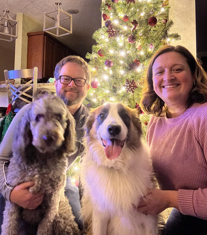 Family photo in front of our Christmas tree.